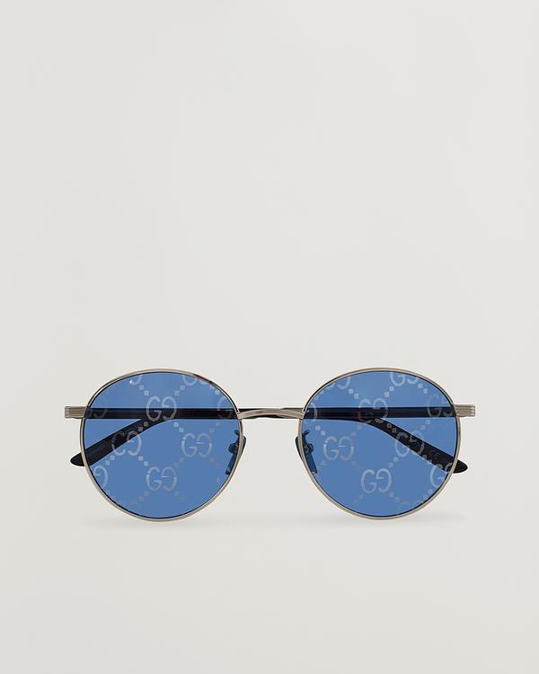 Grey round frame sunglasses from Gucci