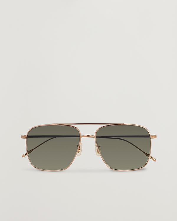Dark yellow d-frame sunglasses from Oliver Peoples