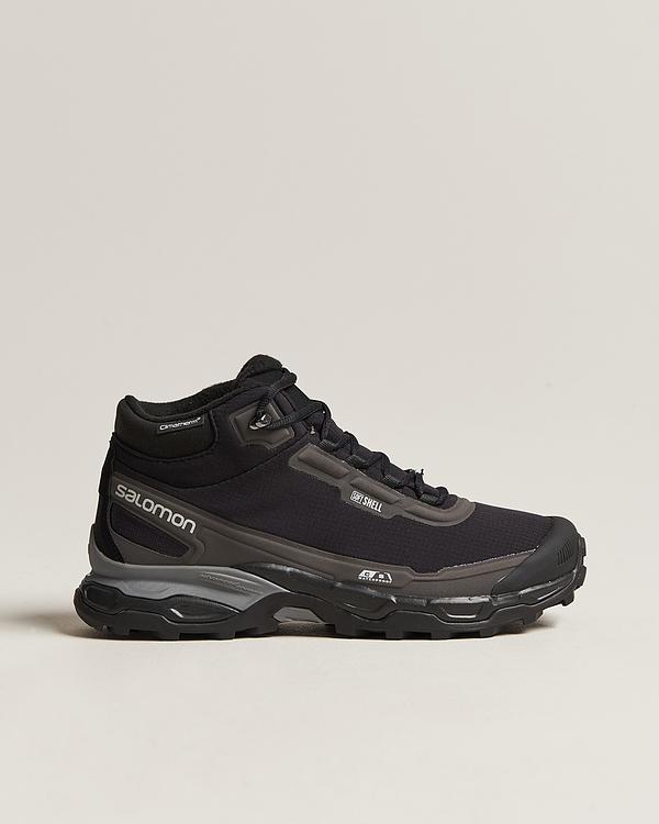 Black lace-up boots from Salomon