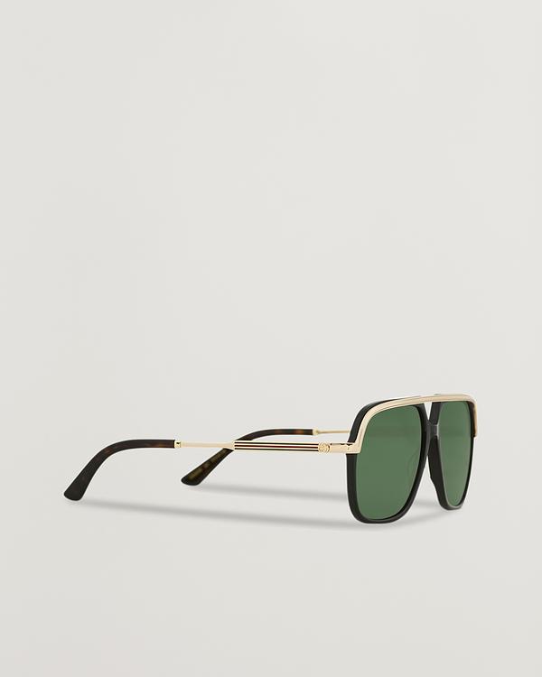 Dark yellow d-frame sunglasses from Gucci