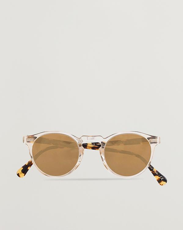 Brown round frame sunglasses from Oliver Peoples