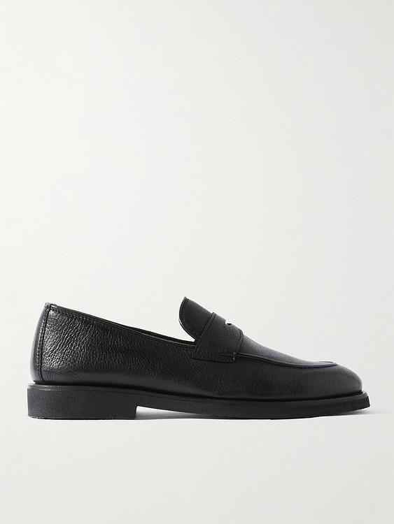 Black loafers from Officine Creative