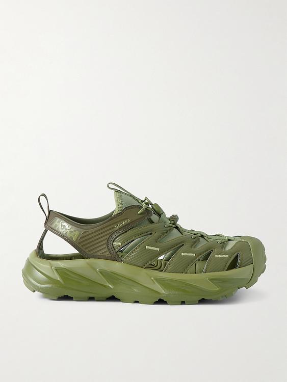 Green sneakers from Hoka