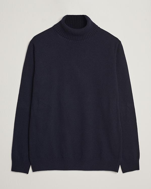 Black turtleneck from Oscar Jacobson
