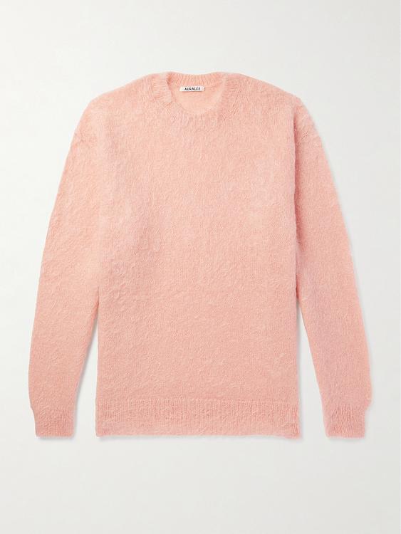 Peach sweater from Auralee