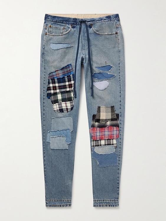 Blue distressed jeans from Greg Lauren