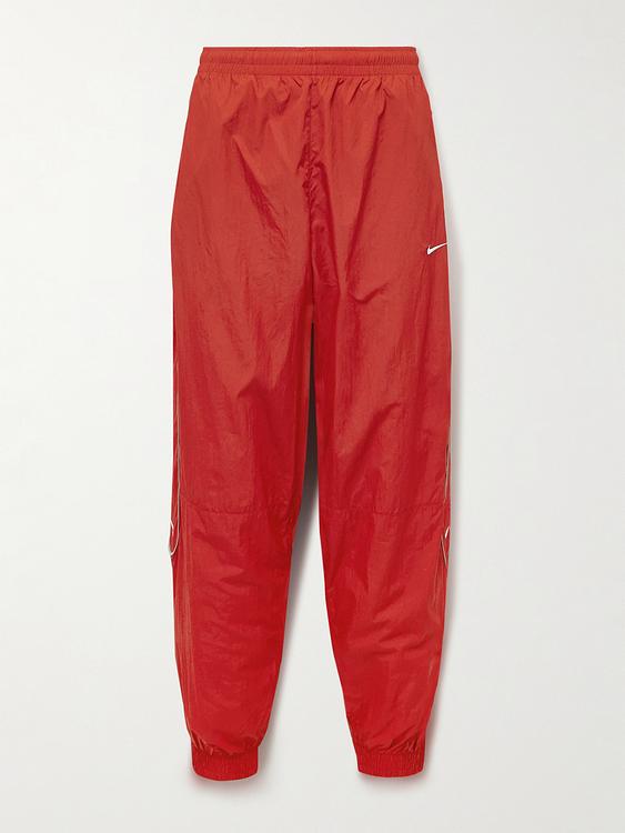 Red casual trousers from Nike