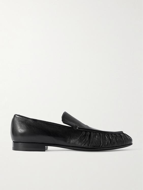 Black loafers from Officine Creative
