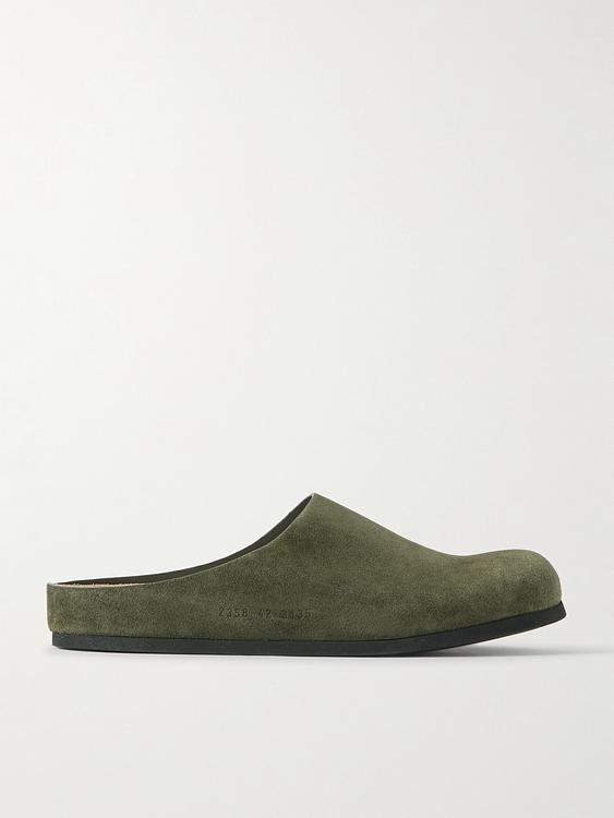 Dark green slippers from Common Projects