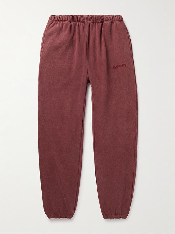 Purple sweatpants from Throwing Fits