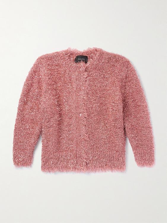 Red cardigan from Simone Rocha