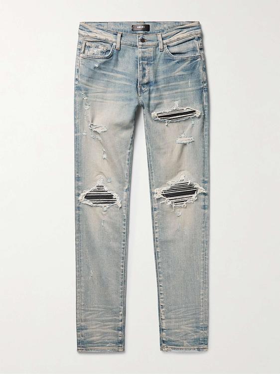 Grey distressed jeans from Amiri