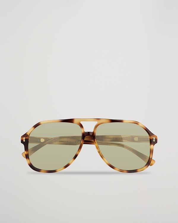 Beige d-frame sunglasses from Gucci