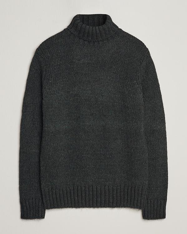 Black turtleneck from Oscar Jacobson