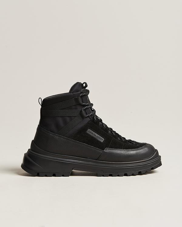 Black lace-up boots from Canada Goose